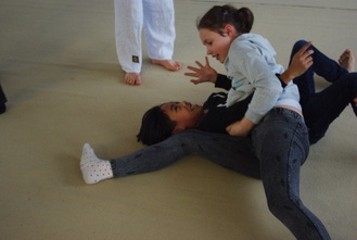 Valmennus- ja kannustustiimin lämmittelypaini